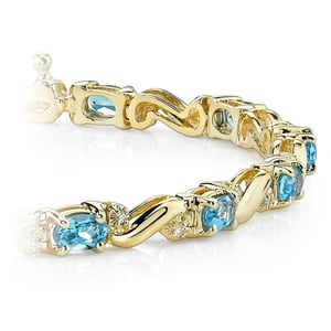 Blue Topaz Bracelet In Yellow Gold With Diamonds (4 Ctw)