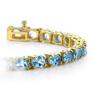 Gold Bracelet With Sky Blue Topaz Gemstones (16 Ctw)